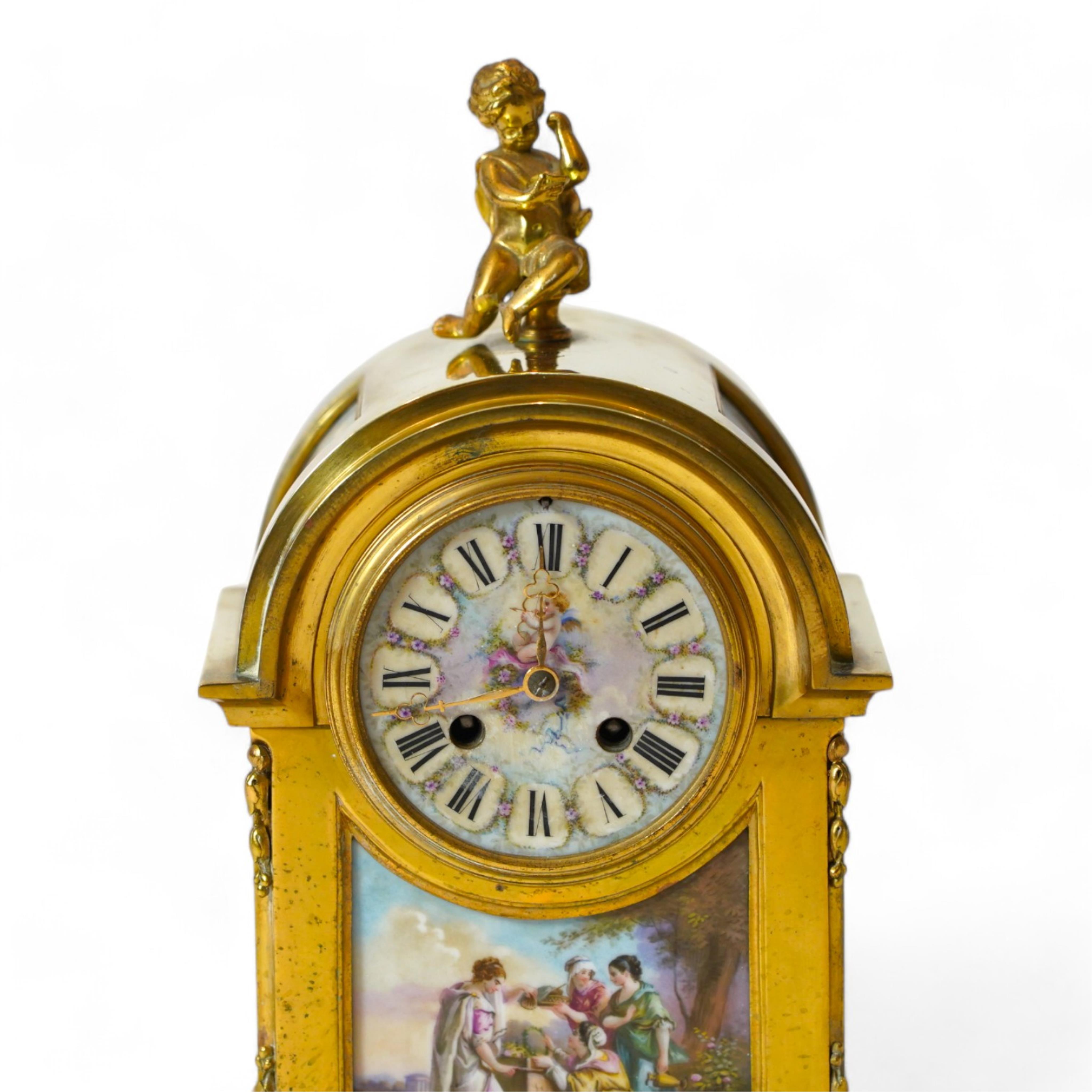 A Louis XVl style gilt brass cased eight day mantel clock